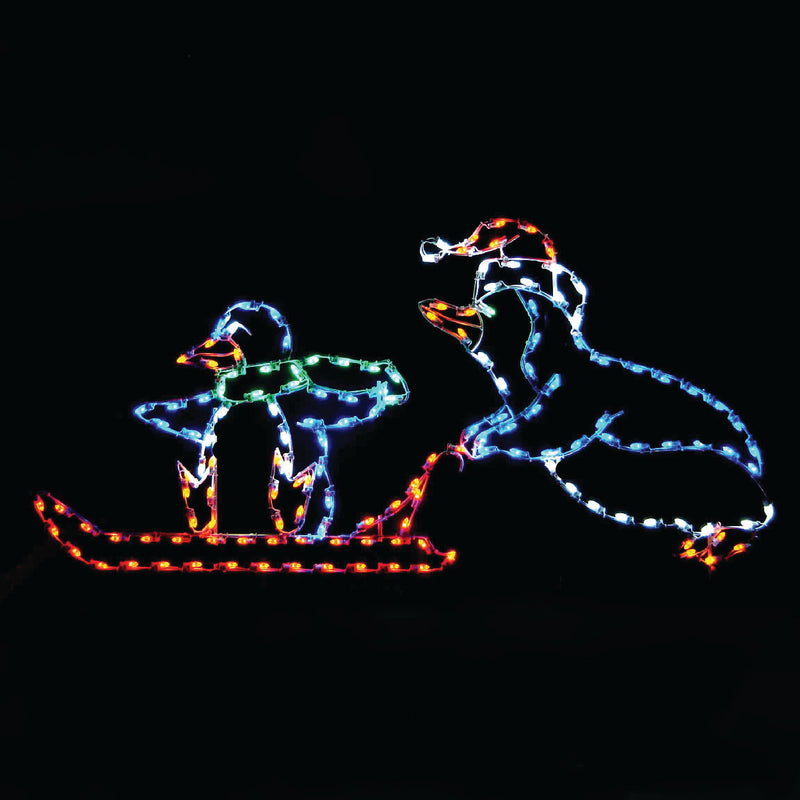 Load image into Gallery viewer, 4' Penguin Pushing Baby on Sled Silhouette Christmas Ground Mounted Decoration