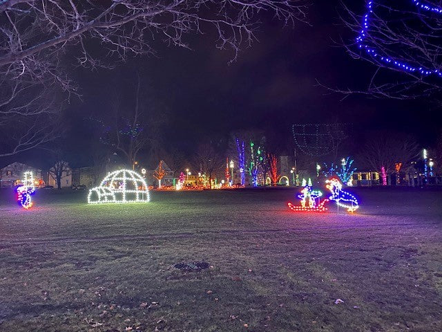 Load image into Gallery viewer, 4' Penguin Pushing Baby on Sled Silhouette Christmas Ground Mounted Decoration